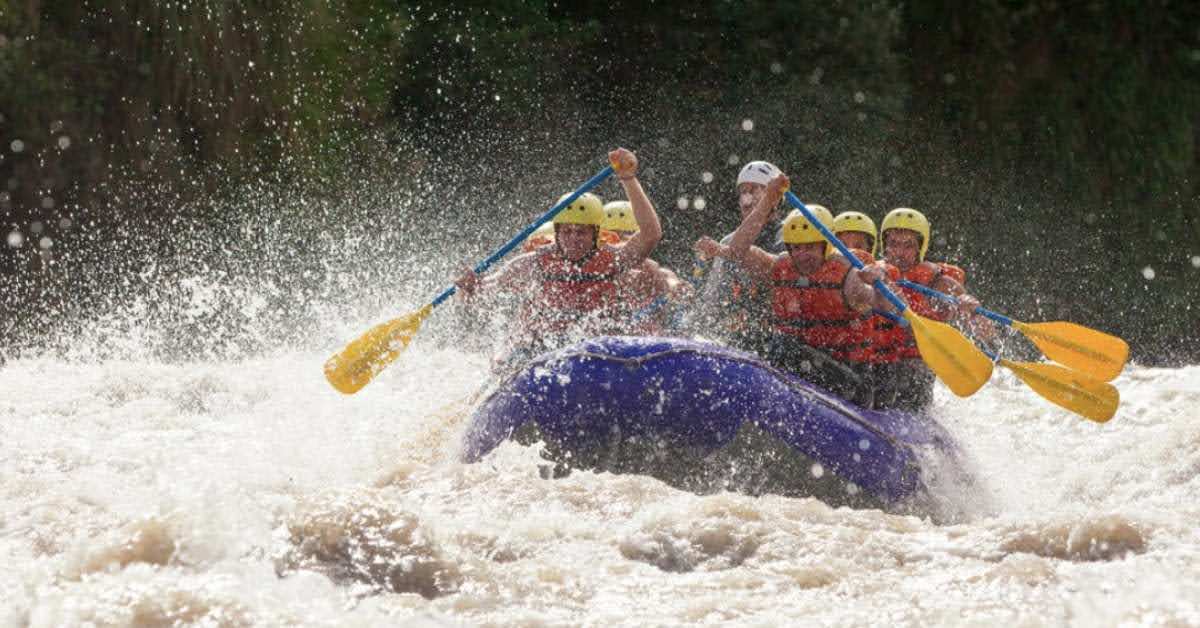 group of people whitewater rafting