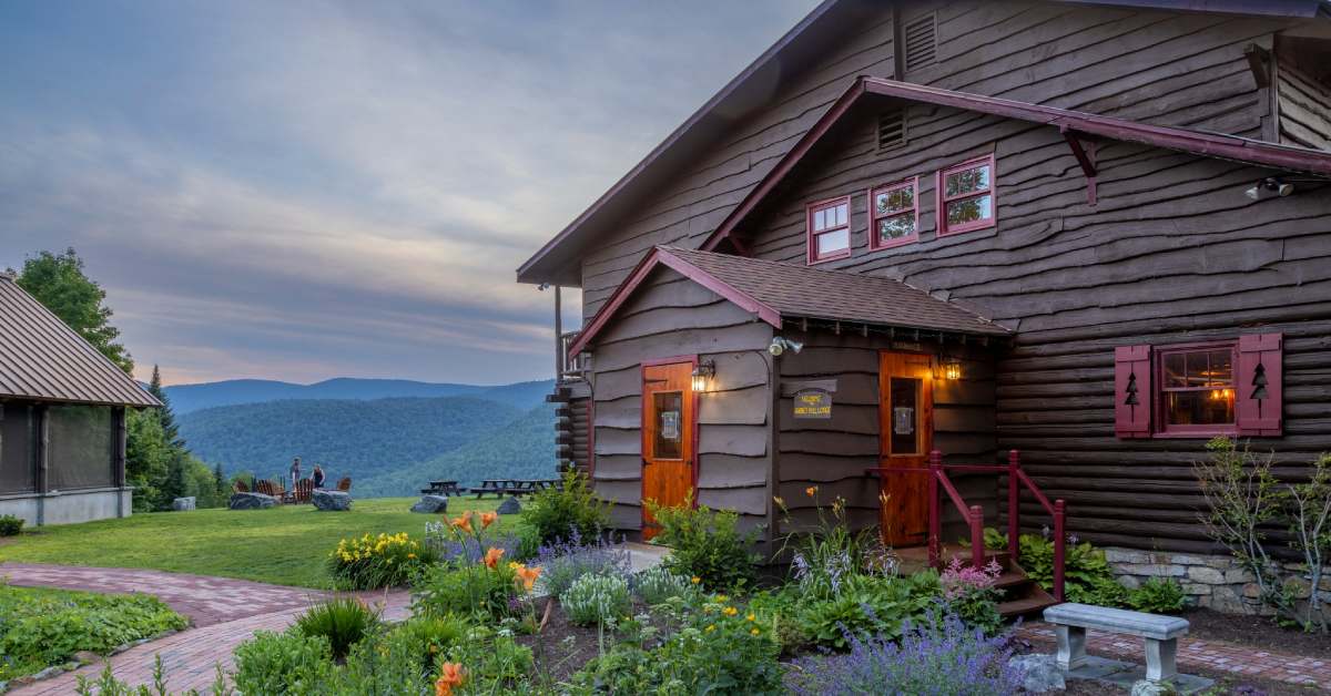 exterior of garnet hill lodge on a summer night