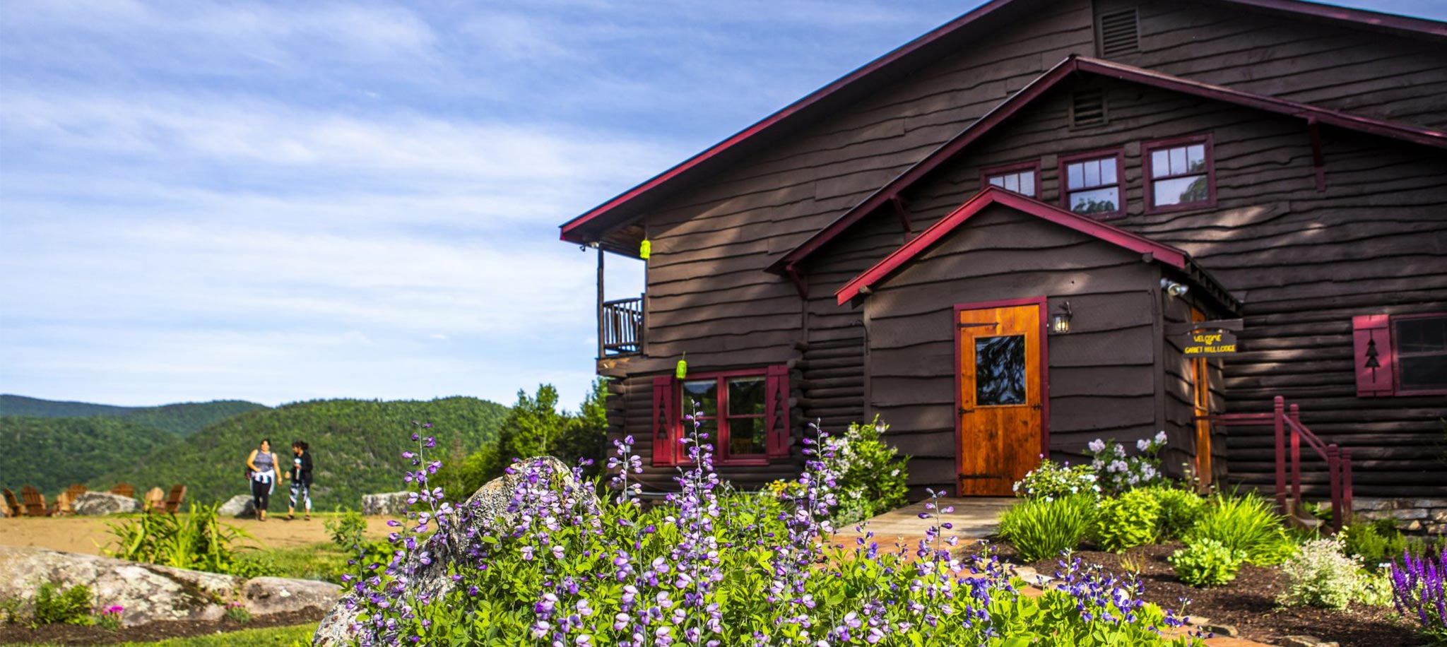 exterior of garnet hill lodge on a sunny day in the summer
