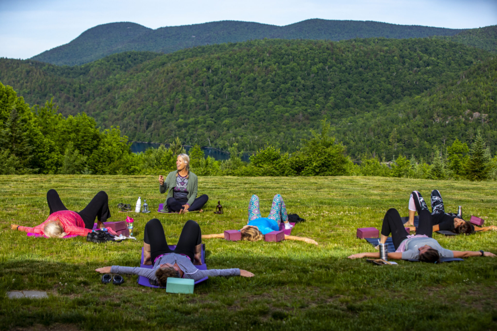 group doing a outdoor yoga class