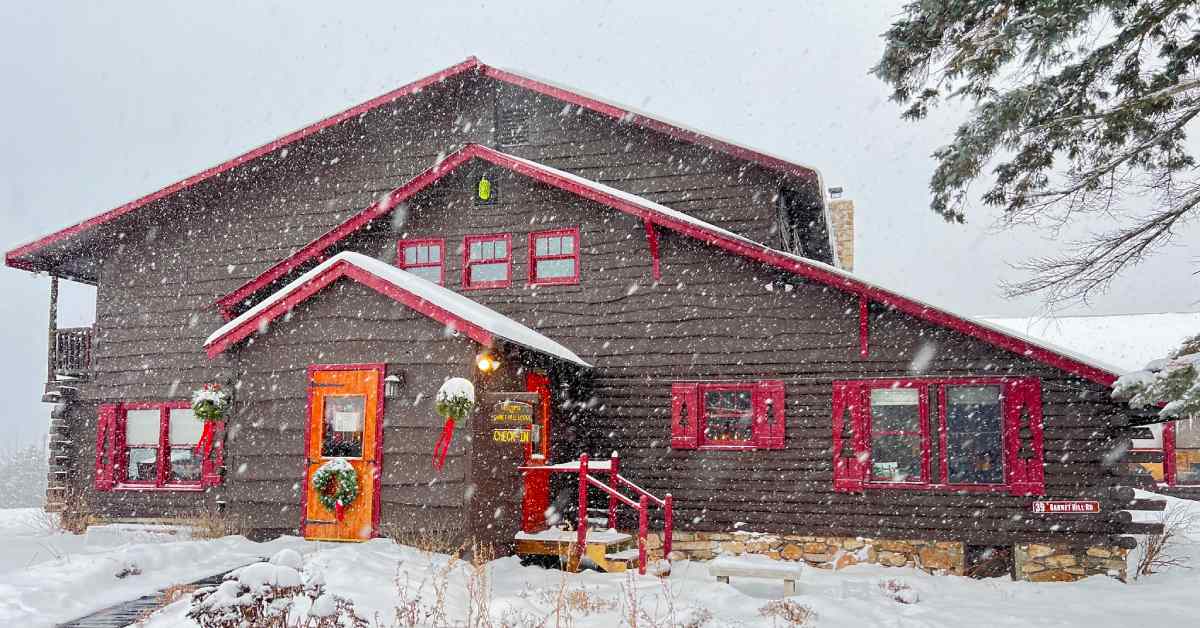 exterior of garnet hill lodge in the snow